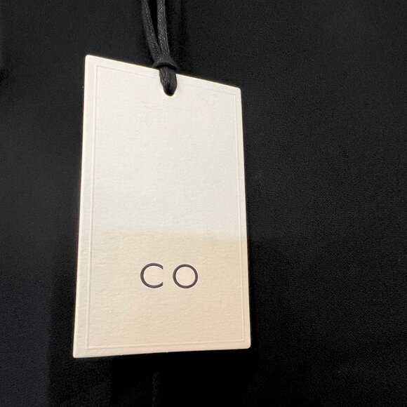 CO Collections Black Napkin Dress NWT – XS Asymmetrical Midi $1,095 Retail NWT - Picture 5 of 13